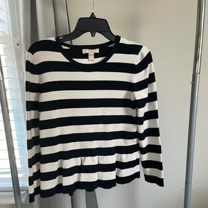 Woman’s striped sweater